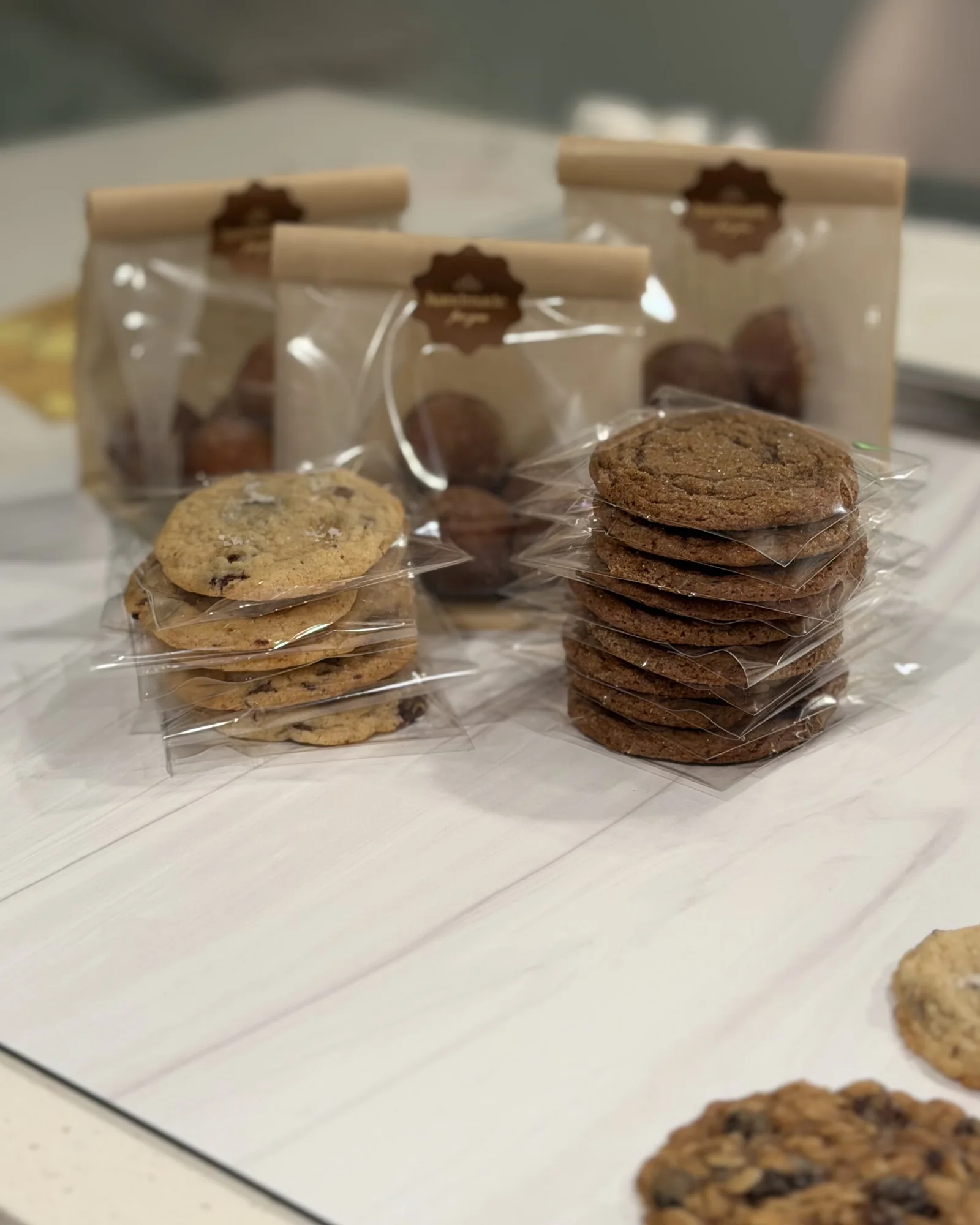 Bags of cookies lined up on the counter