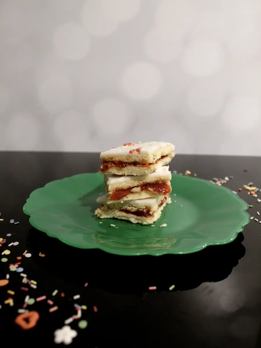 A stack of strawberry jam bars