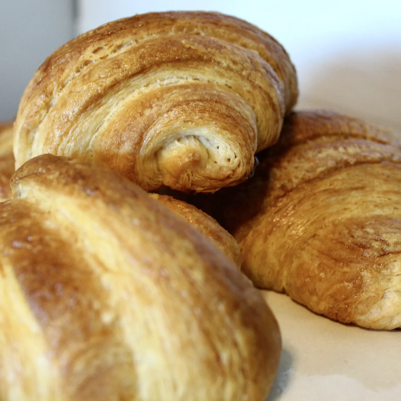 Three golden croissants